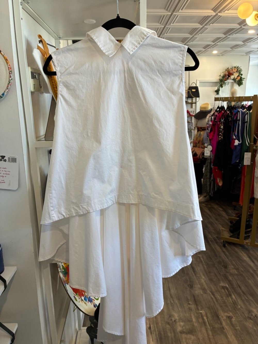 Women’s White Sleeveless Collared top with ascending back